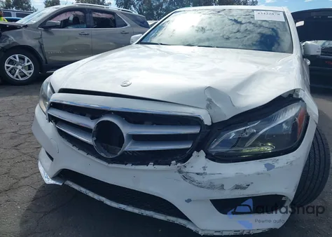 2014 Mercedes-Benz E 350 z USA, uszkodzony, nr VIN WDDHF5KB2EA805907